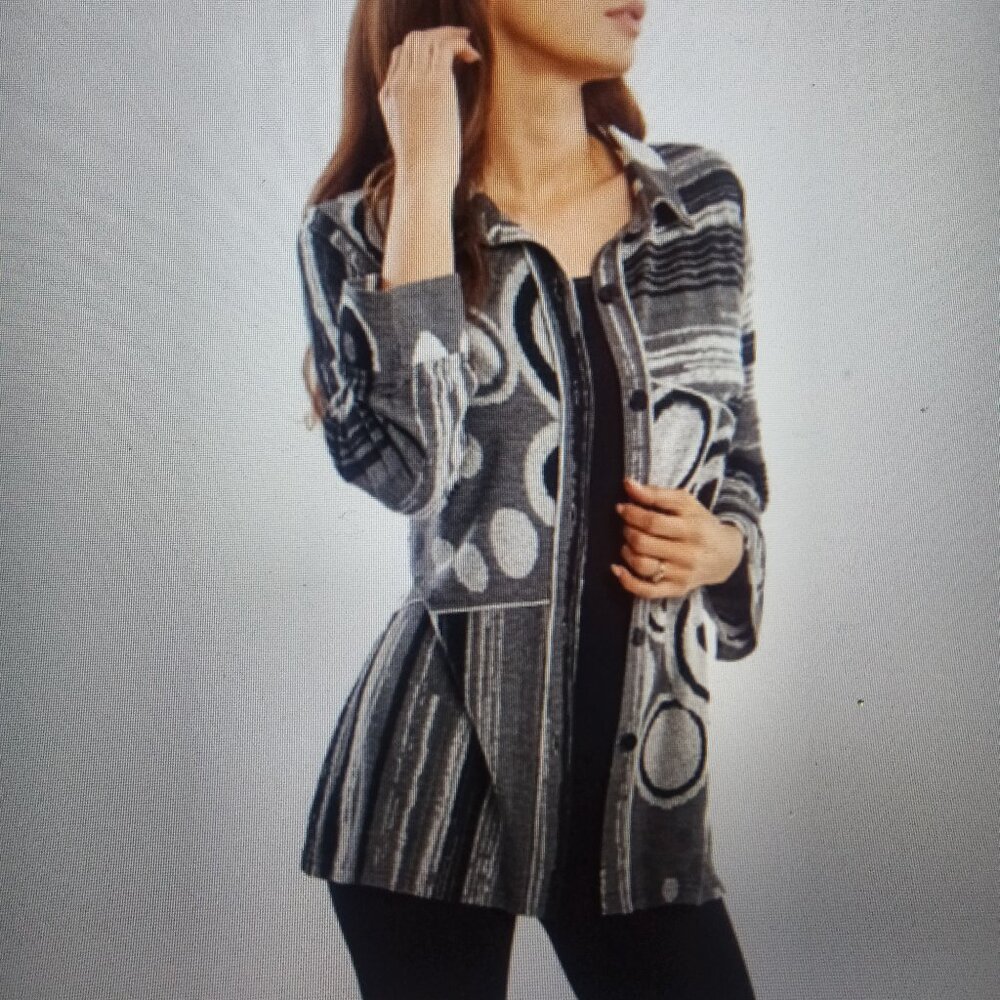 A new relaxed fit shirt jacket in monochrome shades of black and grey.